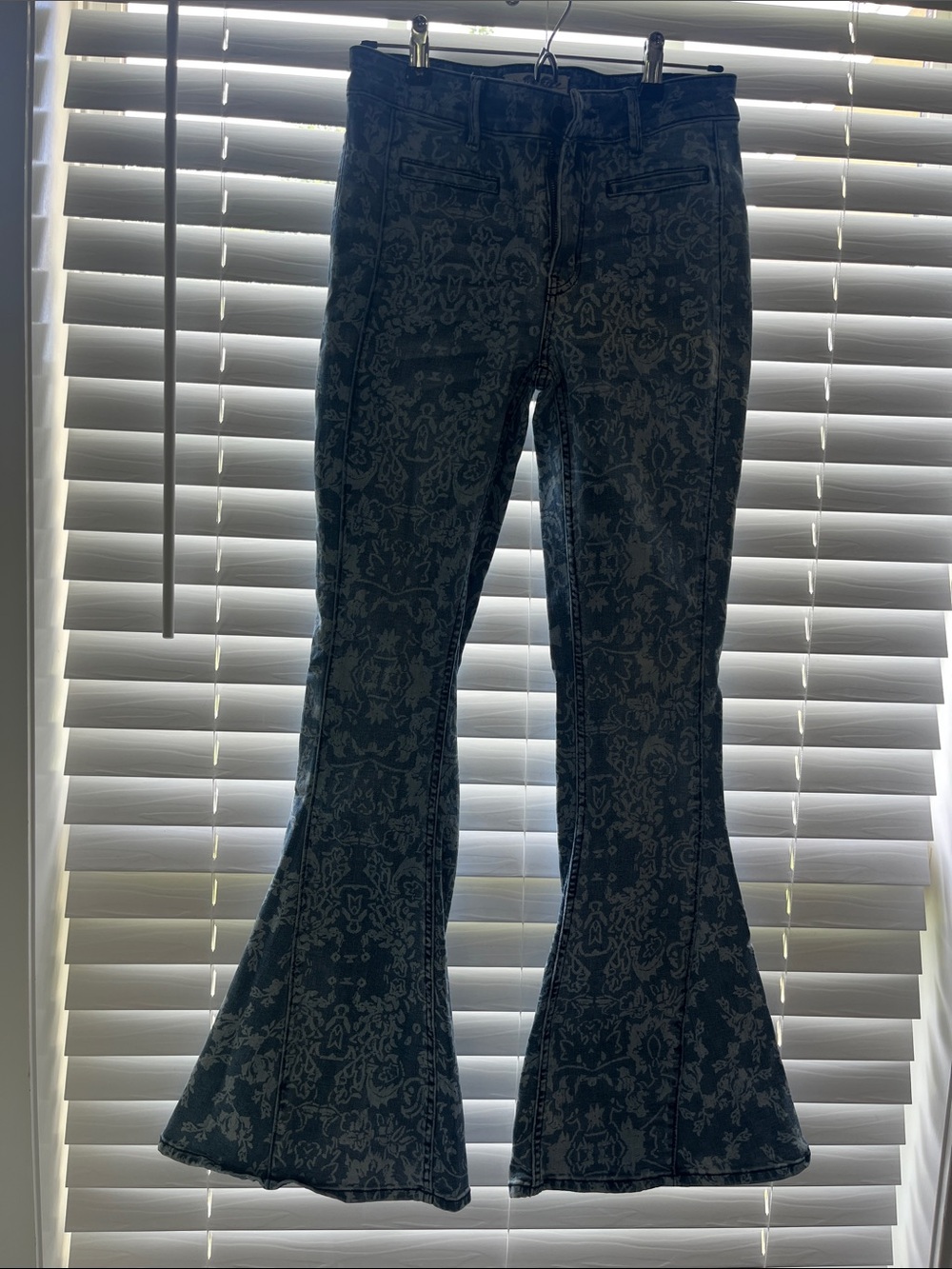 We The Free light-wash floral print denim flared jeans